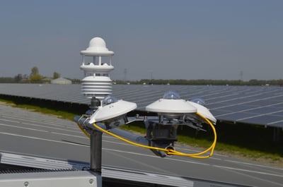 Kipp & Zonen weather station overlooking a field of solar panels